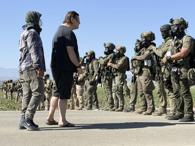 Protesters and federal agents clash during raid at Southern California farm