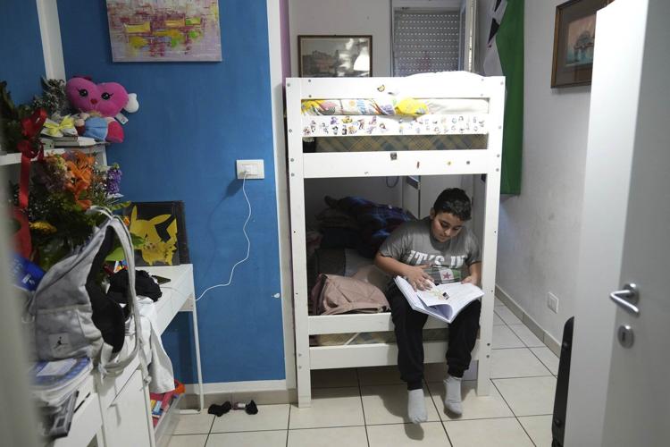 Syrian refugee family that Pope Francis brought to Rome prays for him as they build new life