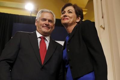 Iowa Gov. Kim Reynolds says her husband has lung cancer