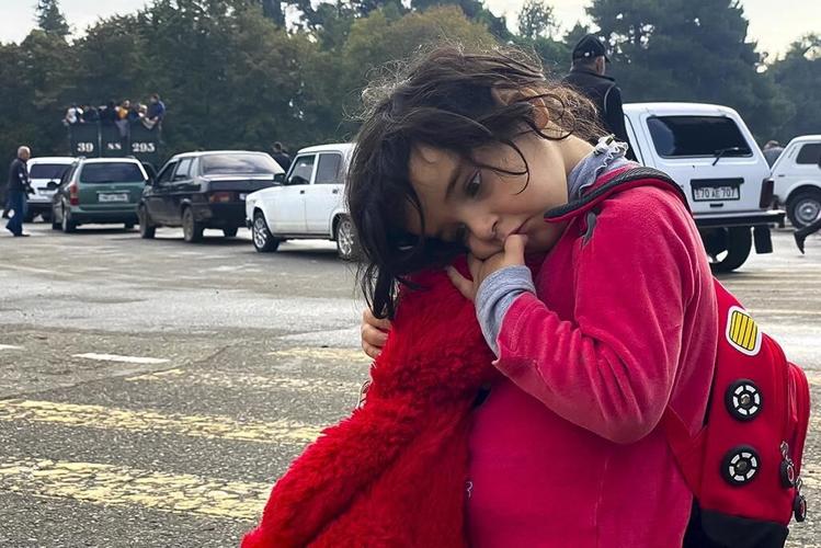 At least 20 dead in gas station explosion as Nagorno-Karabakh residents flee to Armenia