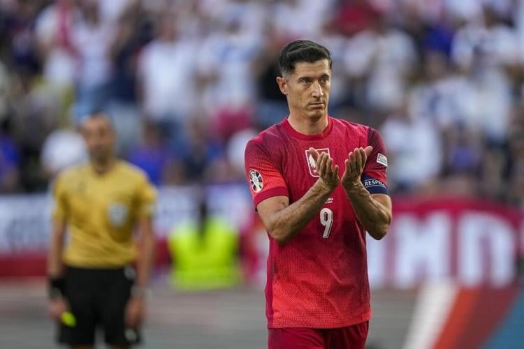 Kylian Mbappé scores on return from broken nose and France draws 1-1 with Poland at Euro 2024