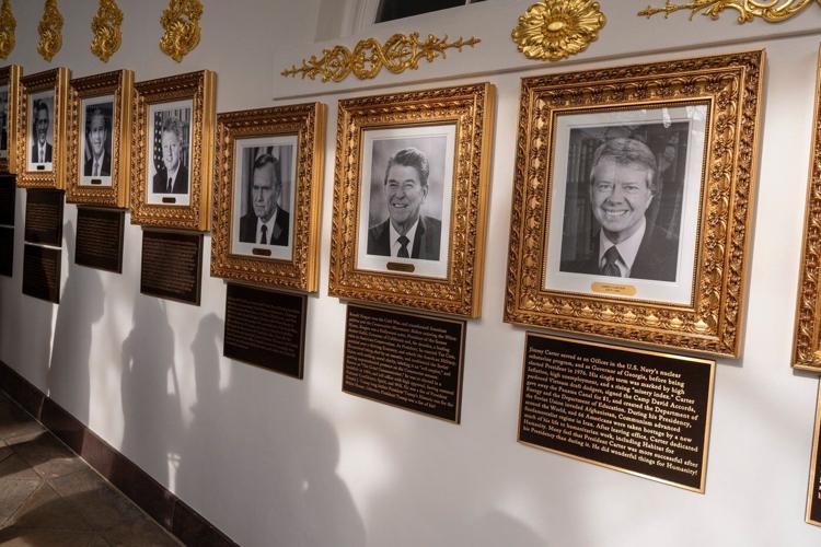 Trump writes partisan plaques for predecessors in his newly installed Presidential Walk of Fame