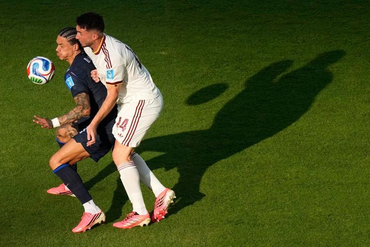 Spain wins its World Cup group, beating Uruguay 1-0 as Muslera’s error sends 2-time champion home