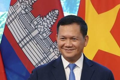 Cambodia's new prime minister wins lawmakers' approval for his youngest brother to become his deputy