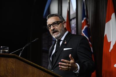 Ontario Premier shuffles cabinet after housing minister resigns