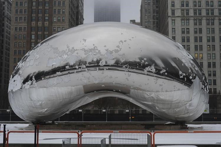 Winter storm with snow, ice, wind and bitter cold pummels much of the northern US