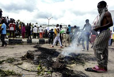 Nigerian leader calls for end to hardship protests, blaming 'political agenda' for violence