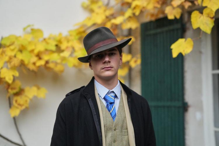 Fedora man unmasked: Meet the teen behind the Louvre mystery photo