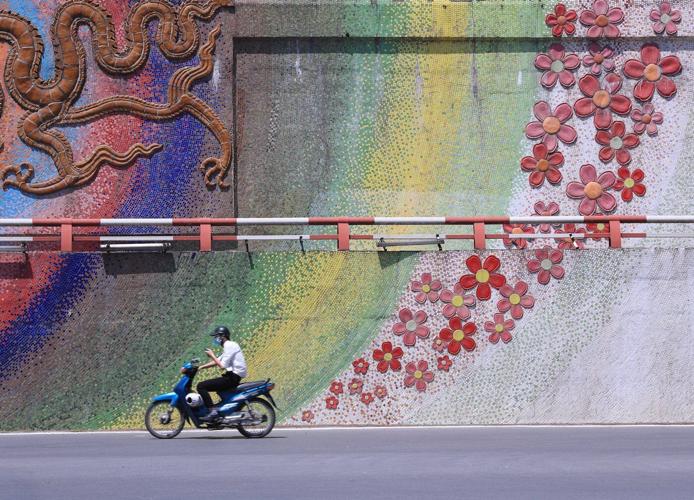Vietnam will ban fossil-fuel motorcycles from central Hanoi over pollution concerns