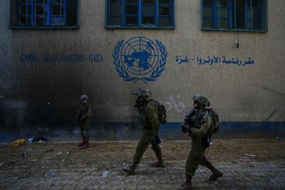 Israel's move to ban a UN agency raises alarm about aid to Gaza even as the implications are unclear