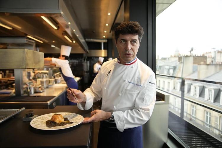 A legendary Paris restaurant reopens with a view of Notre Dame's rebirth and the 2024 Olympics