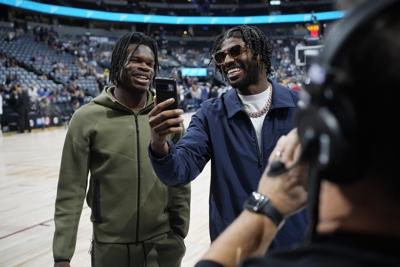 Nuggets celebrate first NBA championship with banner, rings and 119-107 win over the Lakers