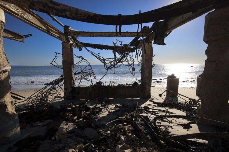 New wildfire warnings issued and more power is shut off as winds rise in Southern California