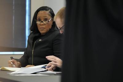 Trump asks top Georgia court to disqualify election probe prosecutor and toss grand jury report