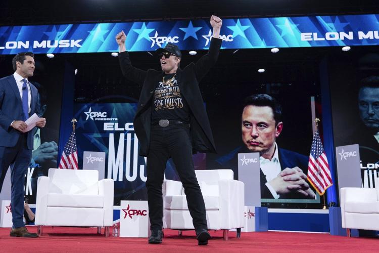 Musk waves a chainsaw and charms conservatives talking up Trump's cost-cutting efforts