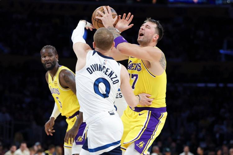 Lakers' Luka Doncic likely out at least one week with a sprained finger, bruised leg