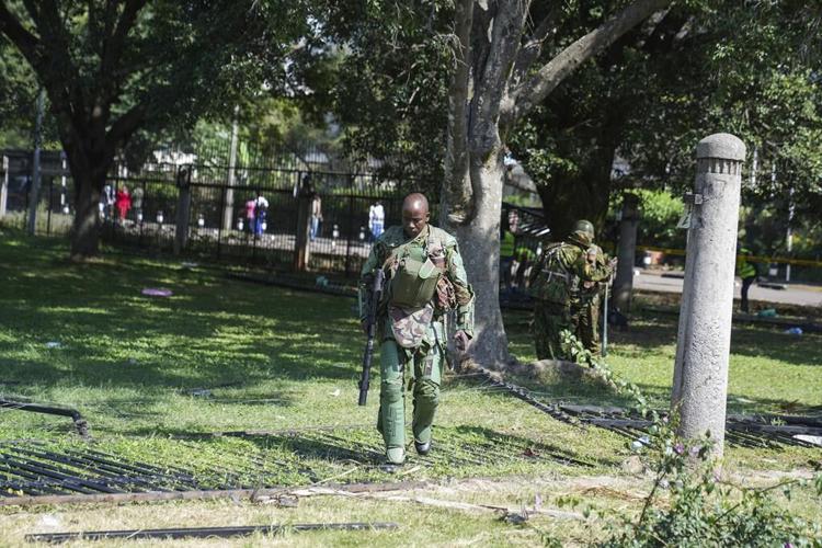 Amid heavy police presence, Kenya starts clearing debris after protests in which at least 6 died