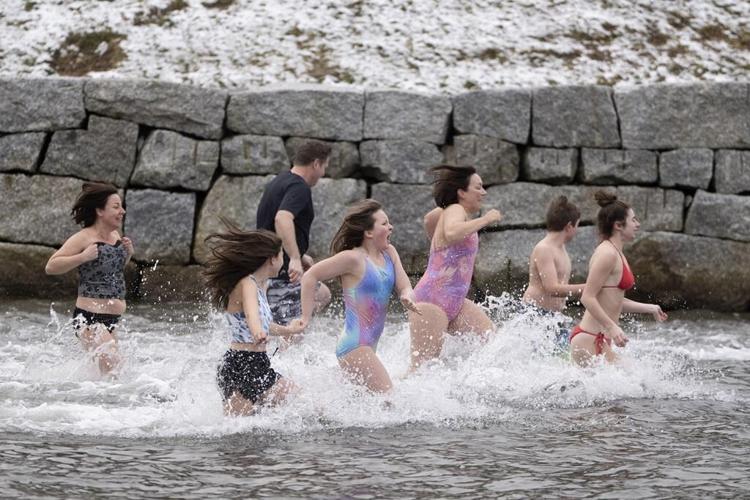 Canadians across country celebrate New Year's Day with polar bear swims