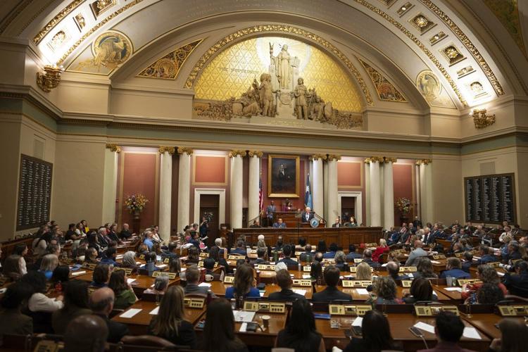 Gov. Tim Walz pledges to protect Minnesota from the 'chaos' he says Trump has unleashed on the world