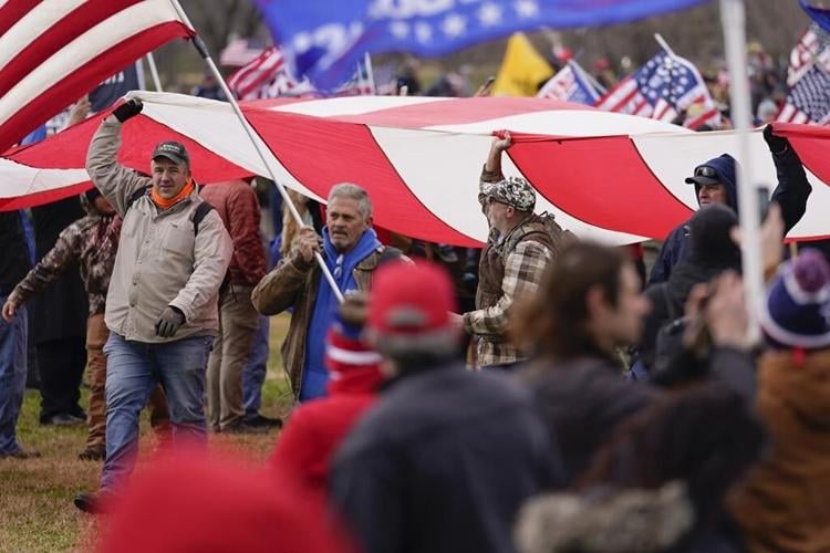 Trump embraces the Jan. 6 rioters on the trail. In court, his lawyers hope to distance him from them