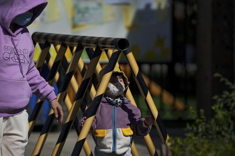 China imposes lockdowns as COVID-19 surges after holiday