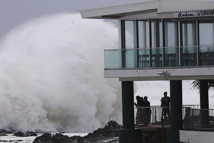 Schools are closed and public transport has stopped as rare cyclone approaches Australian coast