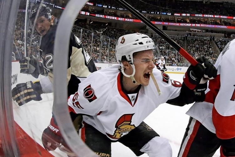 Death of a player from a skate to the neck reignites hockey's stubborn debate over protective gear