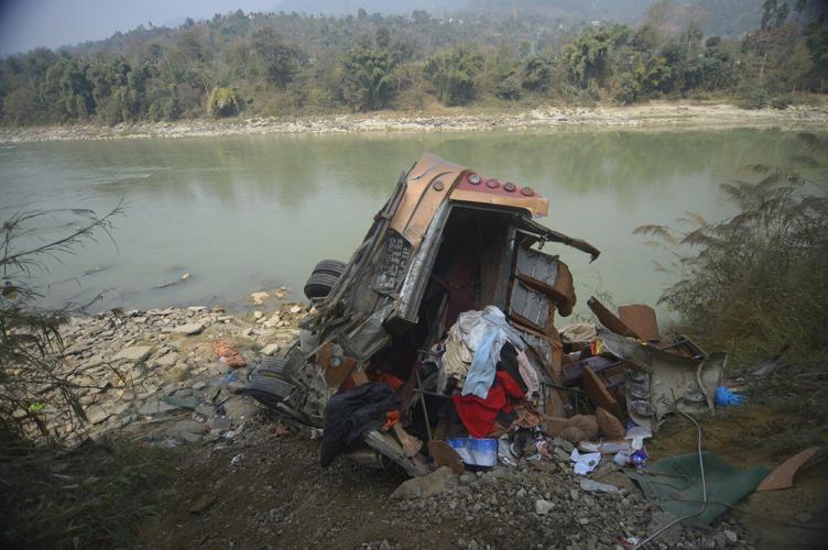 A packed bus plunges off a Nepal highway, killing 19 and injuring 25