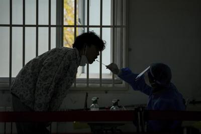 Workers walk out of iPhone factory, highlighting virus woes