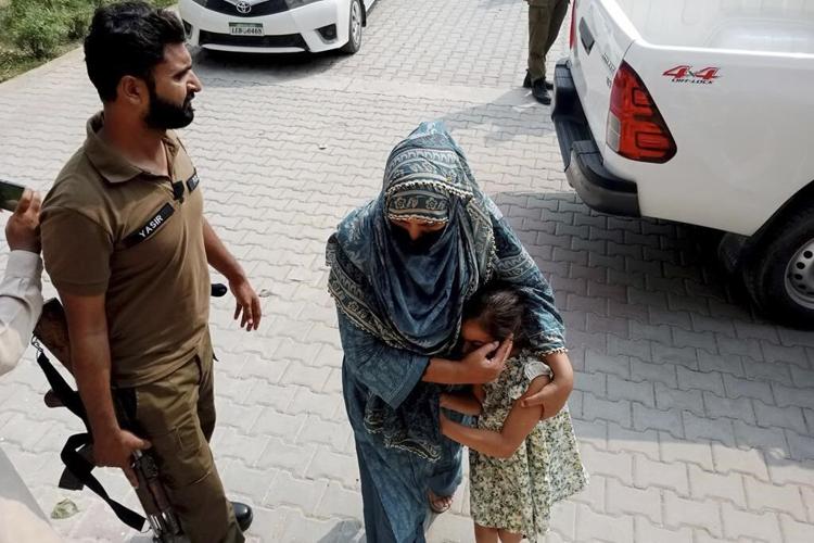 Father, stepmother and uncle of dead girl appear in UK court on murder charge after Pakistan arrests
