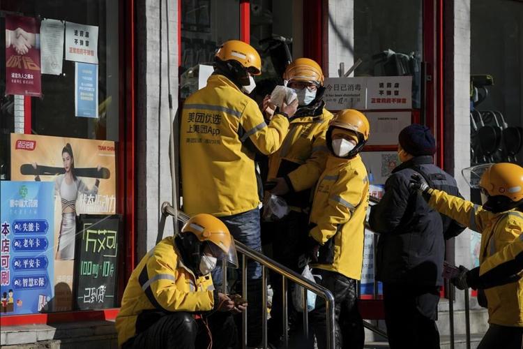 China's looser anti-COVID measures met with relief, caution