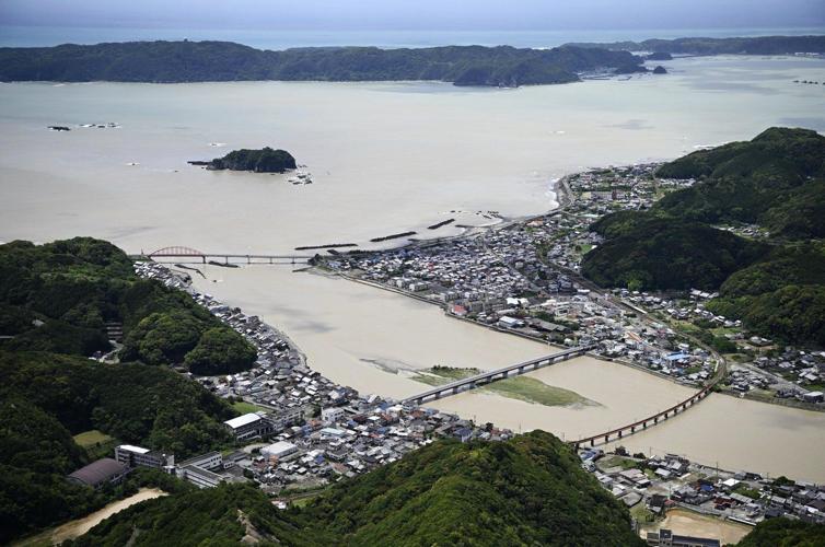 Heavy rain from tropical storm raises flood risks in the Tokyo region