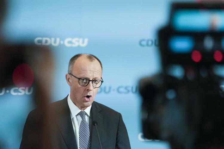 German election winner Merz and center-left rivals start sounding out a possible coalition