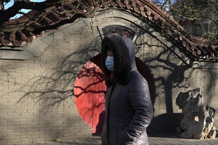 COVID-linked deaths seen in Beijing after virus rules eased