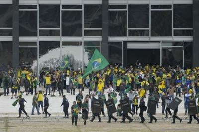 Brazil's top court imposes 17-year sentence, in first case against rioters who stormed the capital