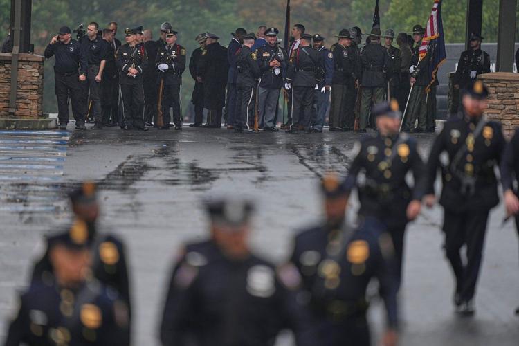 Police gather for funeral of 3 Pennsylvania detectives ambushed by gunman