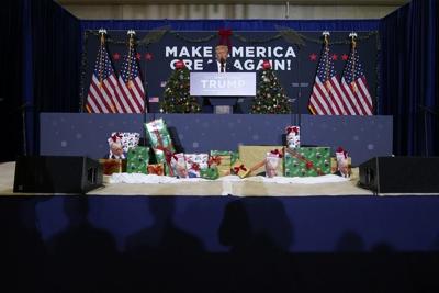 Need last-minute gifts? Presidential hopefuls offer ornaments, gift wrap - and Trump mug shot merch