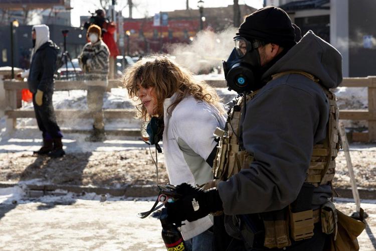 From frigid quiet to outraged sorrow, a few hours on Minneapolis street where agents killed man