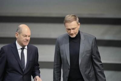 Germany's leader vows to fix a spending crisis that's worsening gloom in the struggling economy