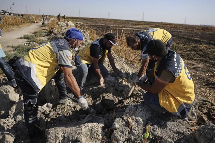 At a mass grave on the outskirts of Damascus, some families learn the fate of missing loved ones