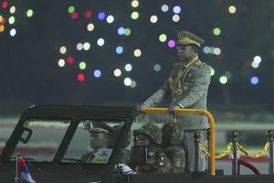 Myanmar ends state of emergency and military leader switches roles to prepare for polls