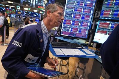 Wall Street rises toward the finish of its best week in nearly 2 months after bond yields relax