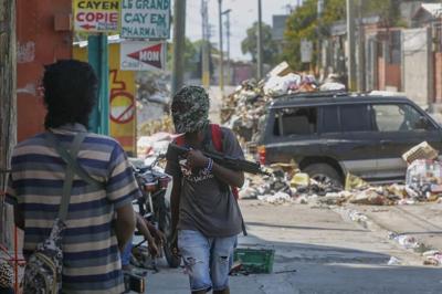 Author Mitch Albom, 9 others evacuated by helicopter from violence-torn Port-au-Prince