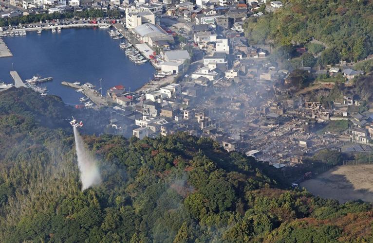 Fire burning in southwestern Japan damages 170 homes and forces evacuations