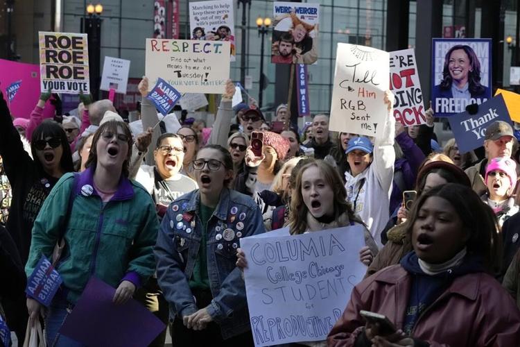 Abortion rights at forefront of Women's March rallies in runup to Election Day