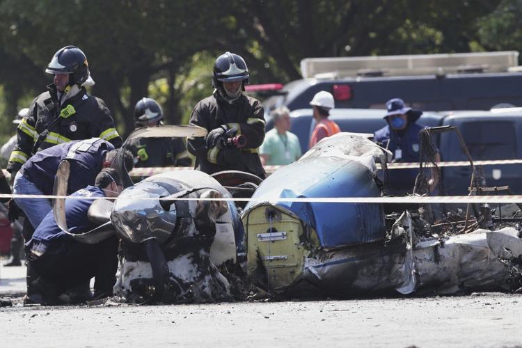 A small plane slams into a Brazilian street and kills 2 people on board