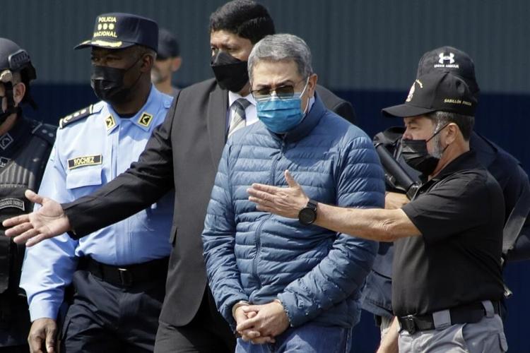 Former president of Honduras convicted in US of aiding drug traffickers
