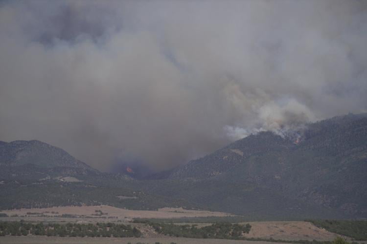 Utah declares a state of emergency and restricts fireworks as US largest wildfire grows