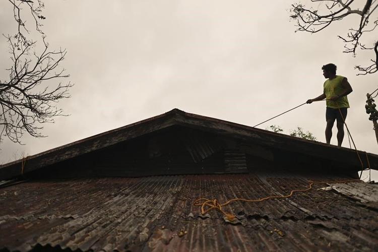 An overwhelmed Philippines braces for another typhoon, the fifth major storm to hit in three weeks