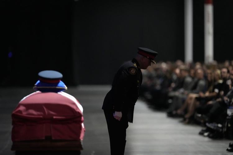 Toronto officer killed during police raid was 'loved by everyone,' mourners told